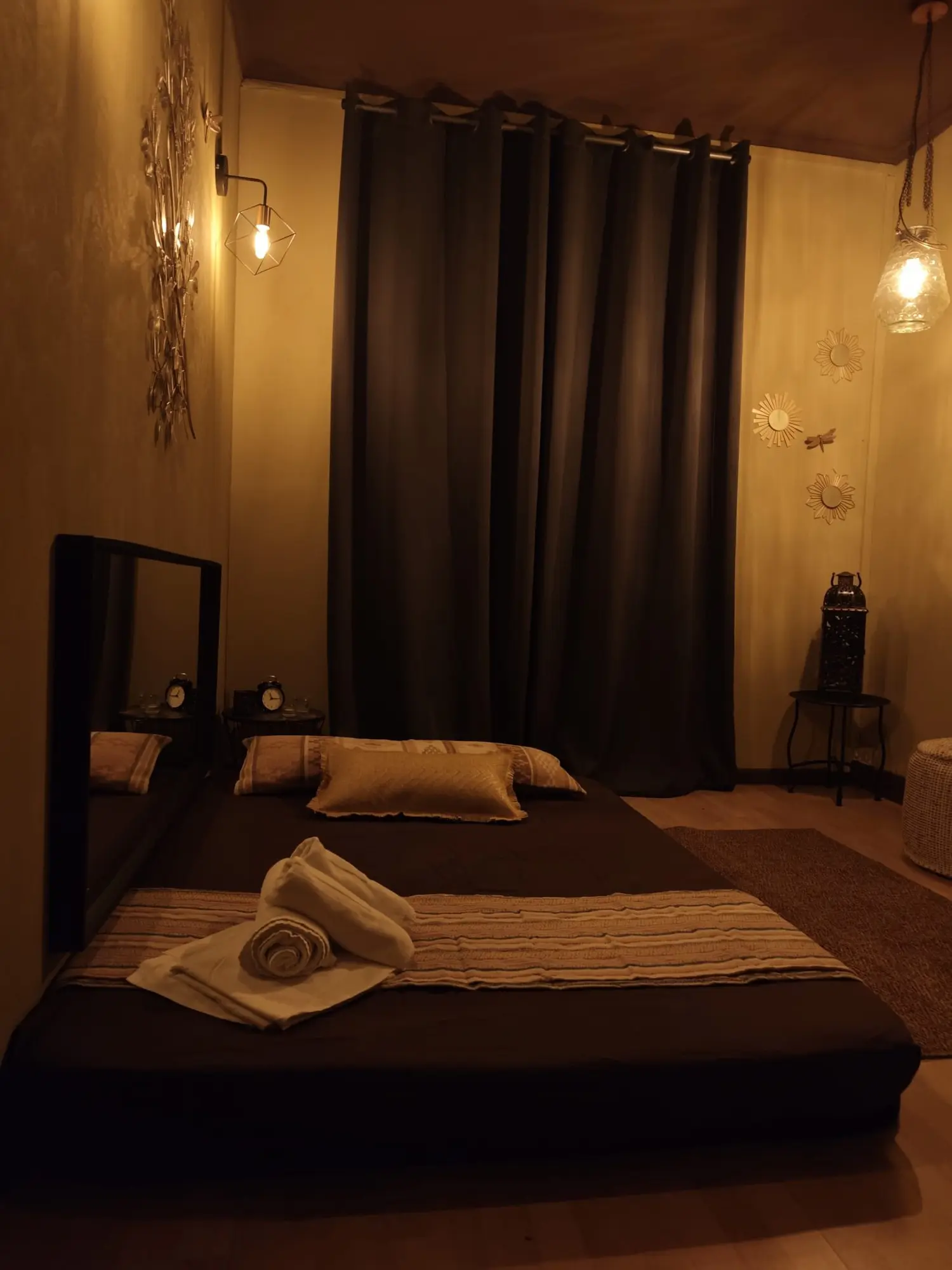 Private massage room with warm lighting at AMBAR Barcelona